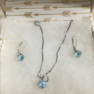 Sterling silver blue topaz set